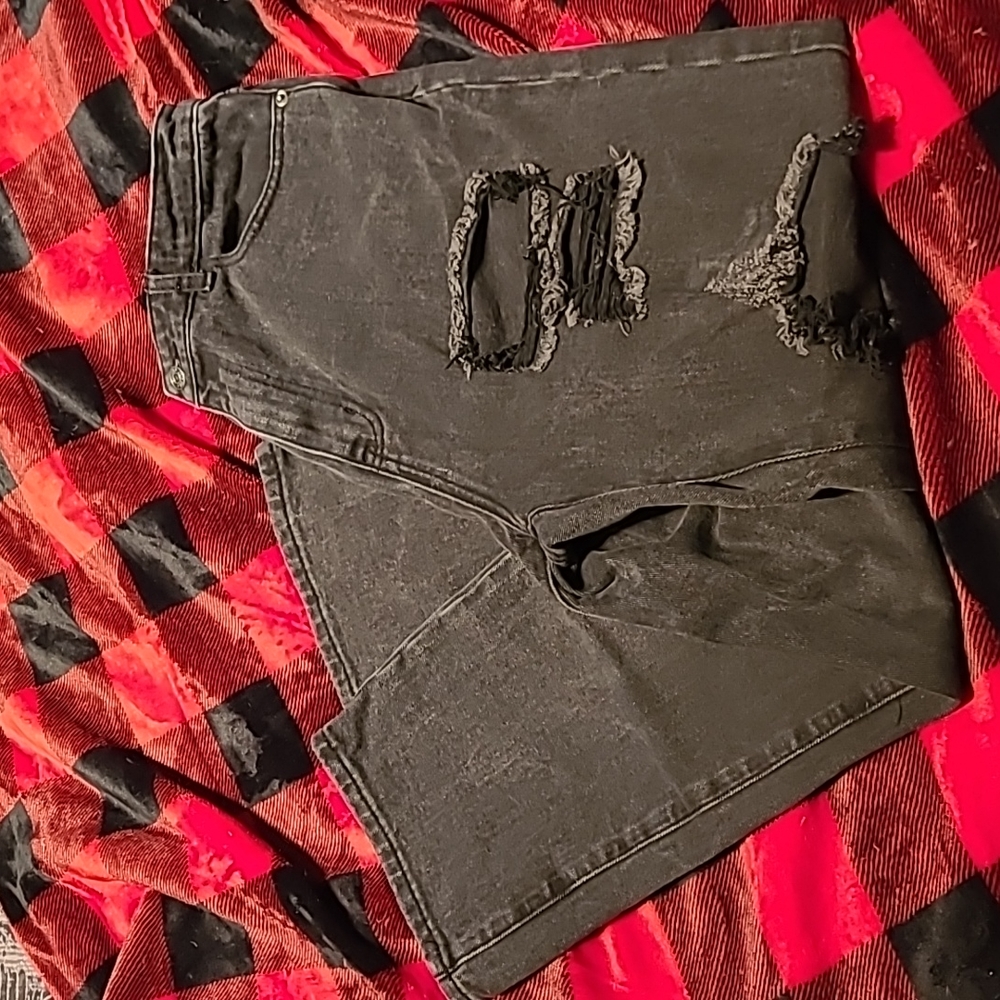 Black straight leg holey jeans